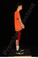  Danior black shorts black sneakers dressed orange t shirt shoes sports standing whole body 0015.jpg